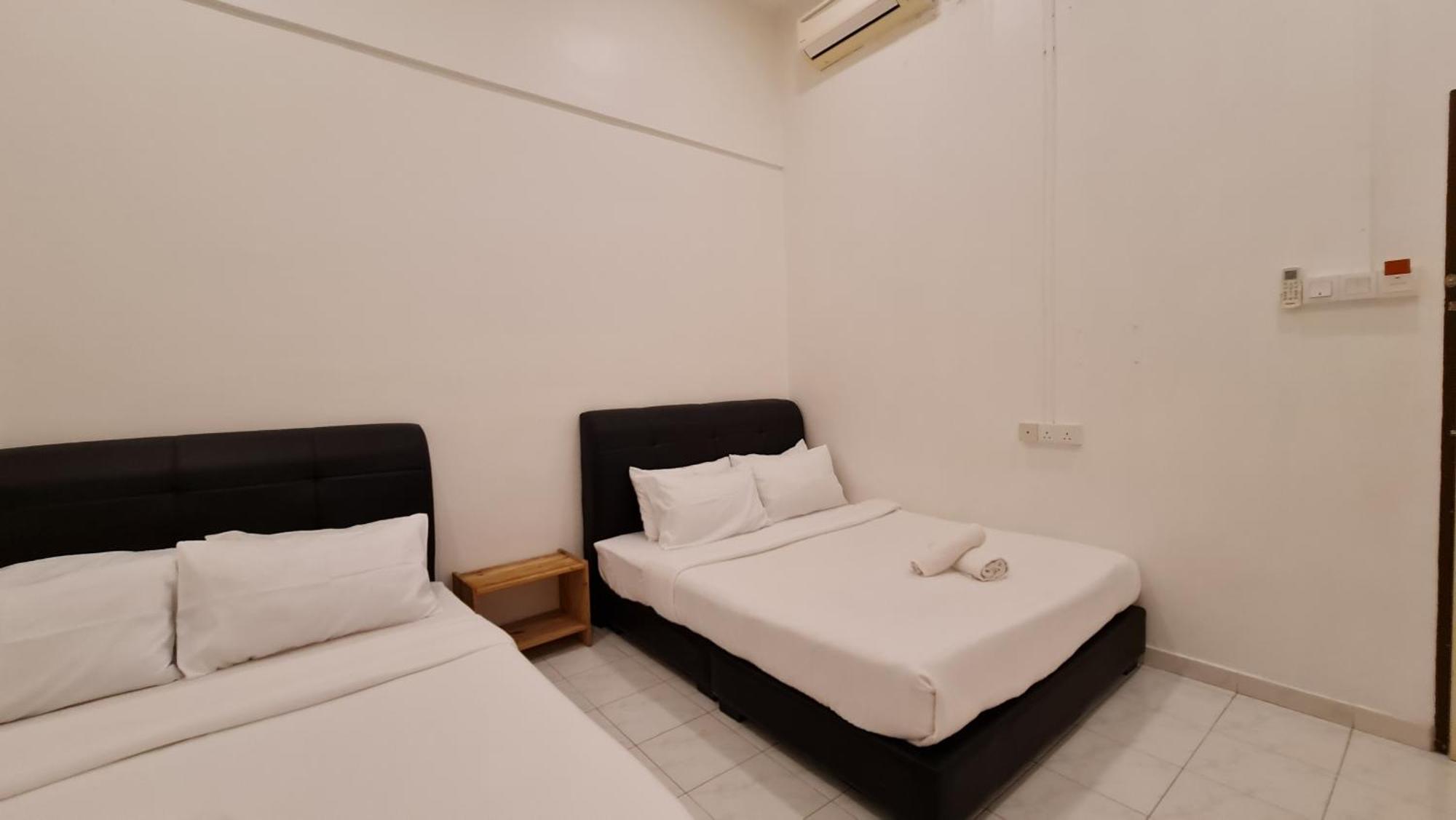 Jade Guesthouse Jonker Melaka Номер фото